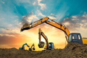 Alat berat seperti ekskavator dan bulldozer yang digunakan dalam proyek konstruksi
